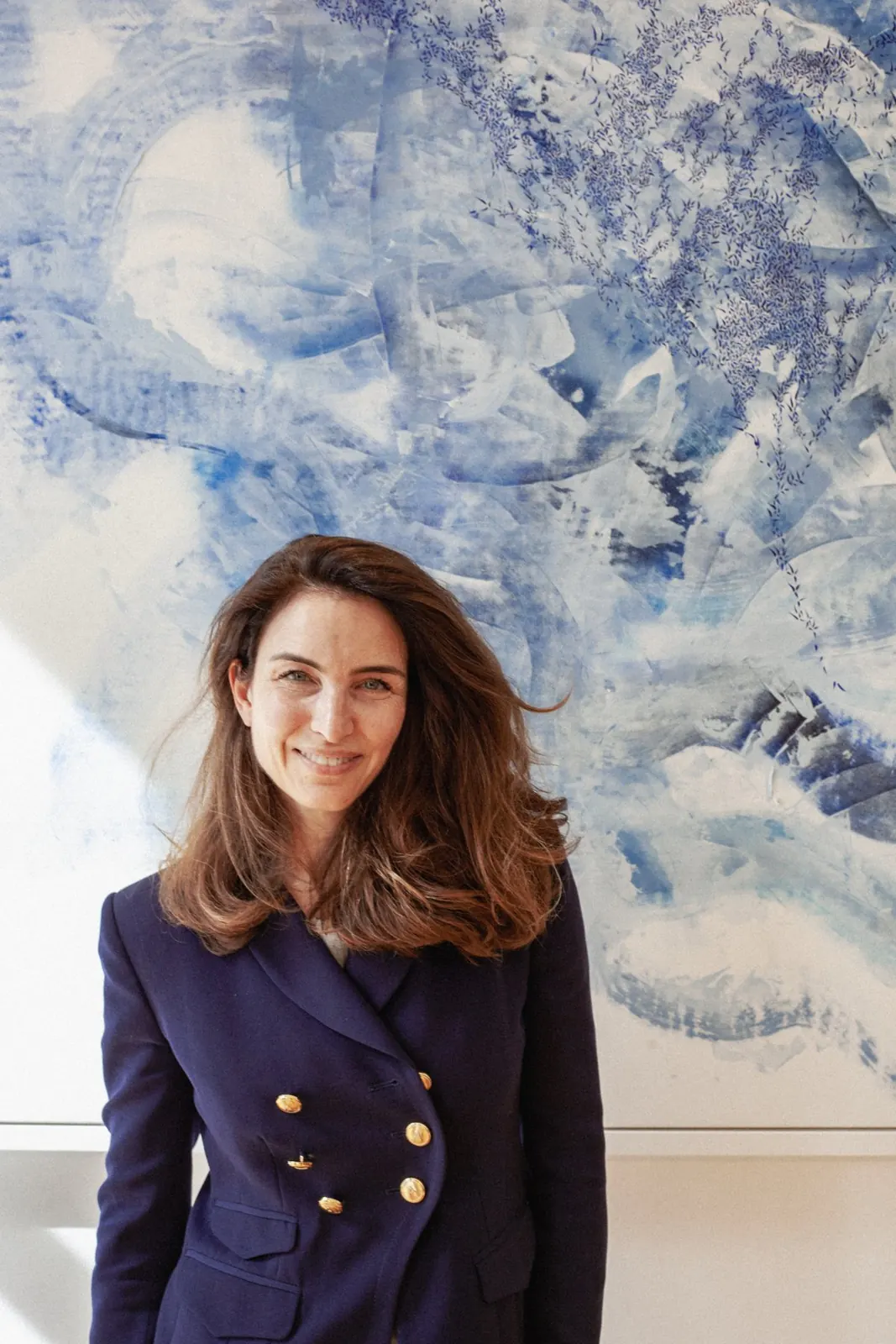 Portrait of an artist in front of her painting, London