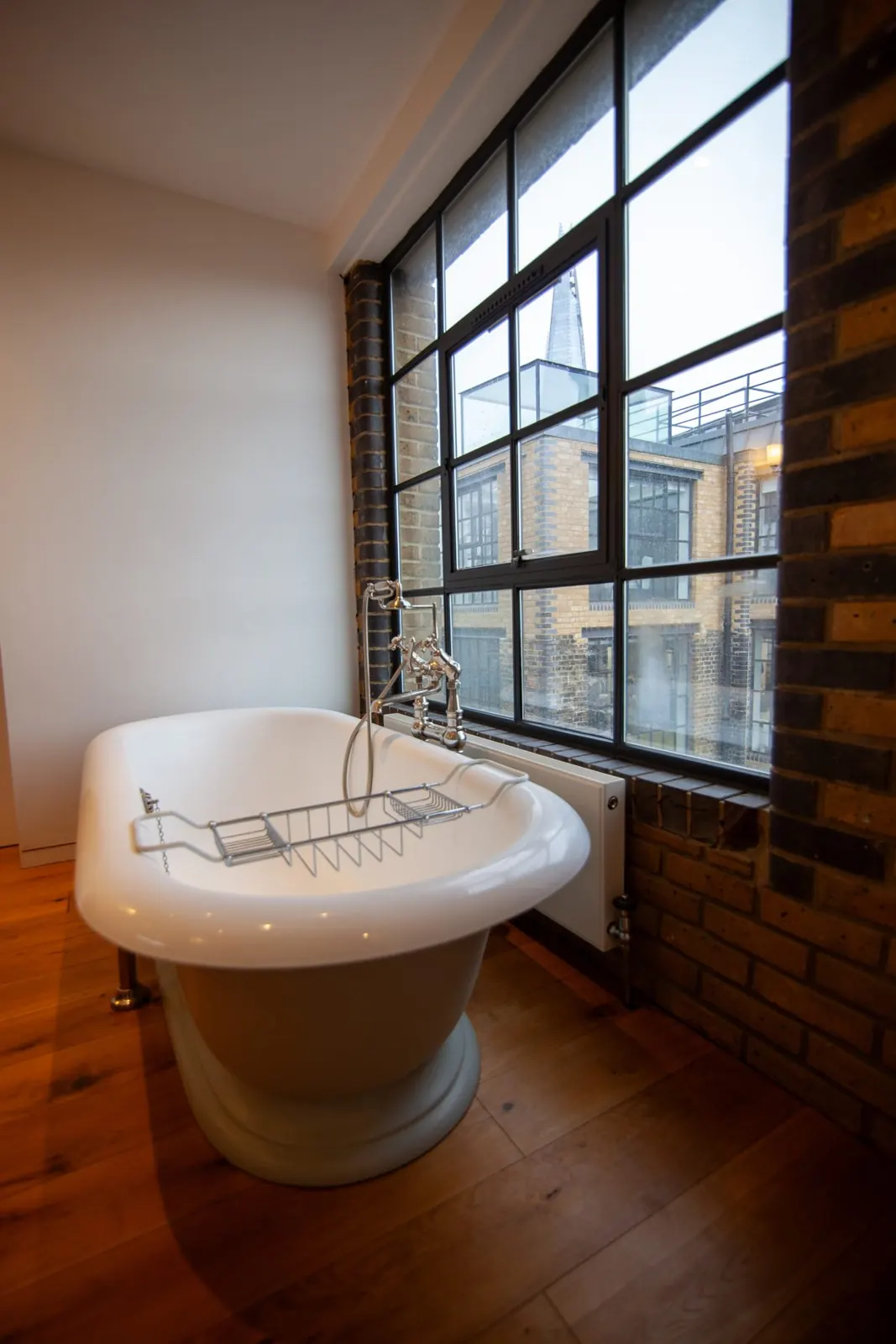 Freestanding bath in an LSE flat, London